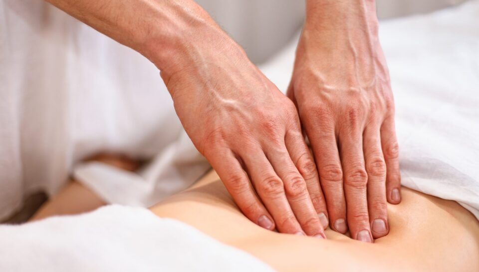Male,Masseur,Makes,Visceral,Massage,Of,Internal,Organs,Through,The