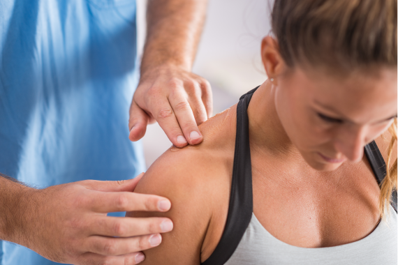 physical-therapy-therapist-addressing-trapezius-m-2021-08-26-16-53-18-utc