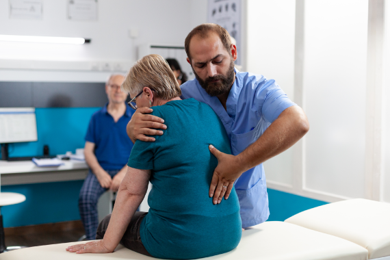 medical-assistant-treating-woman-with-back-and-spi-2021-12-09-04-50-44-utc medical-assistant-treating-woman-with-back-and-spi-2021-12-09-04-50-44-utc