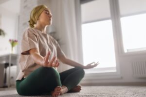 woman with cancer doing yoga