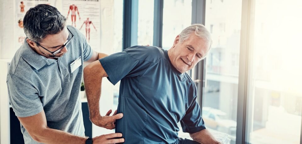 Physiotherapy,,Chiropractor,And,Elderly,Man,With,Back,Pain,For,Rehabilitation, man with back pain